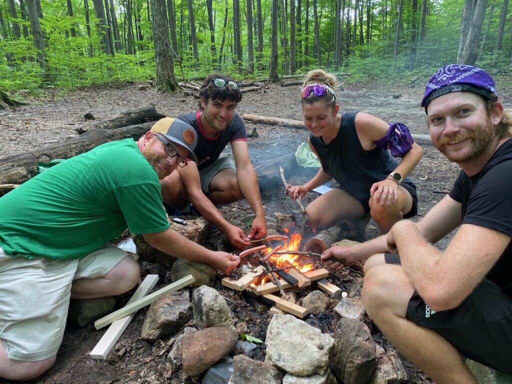 IMG_3499 Group of people building a fire