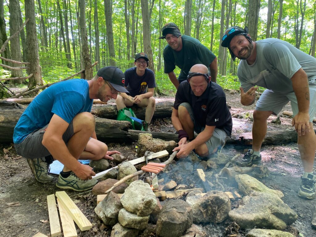 IMG_3503 Group of people building a fire